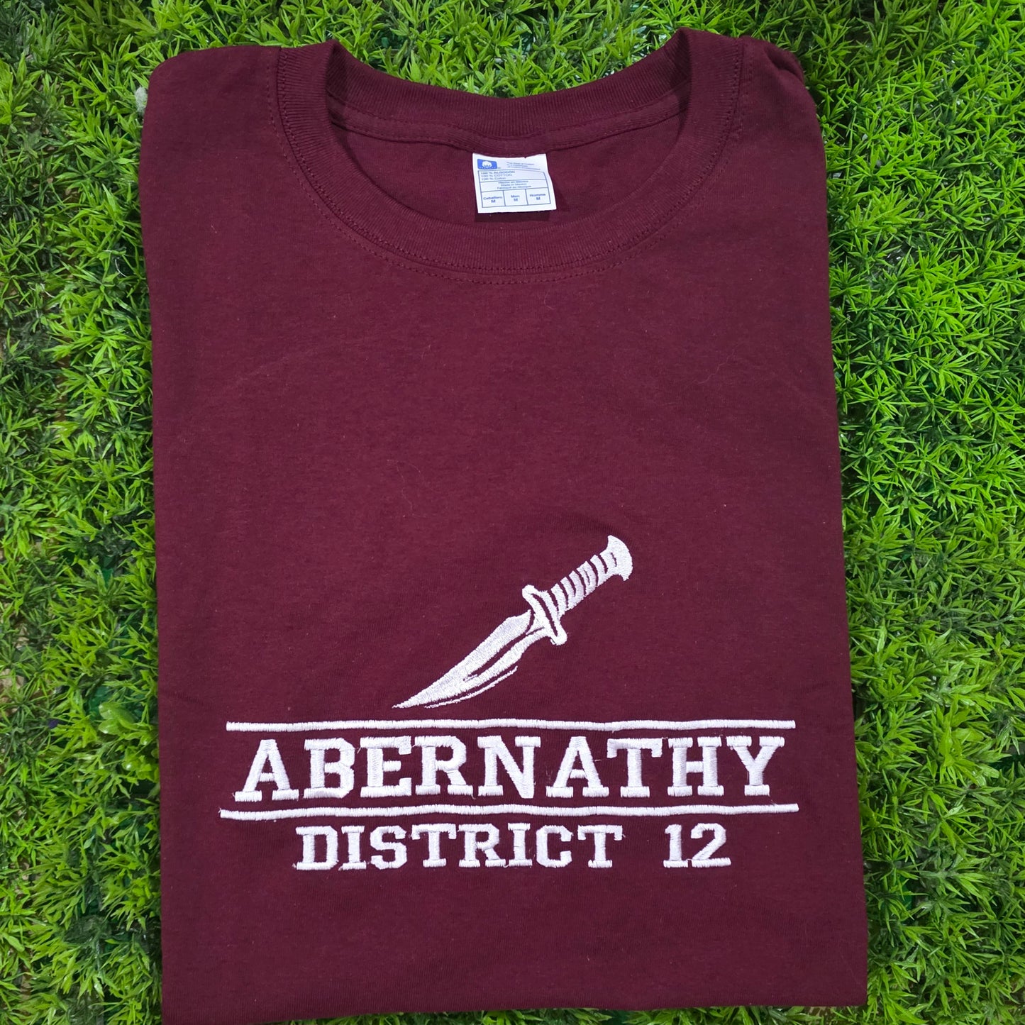 Playera bordada THG