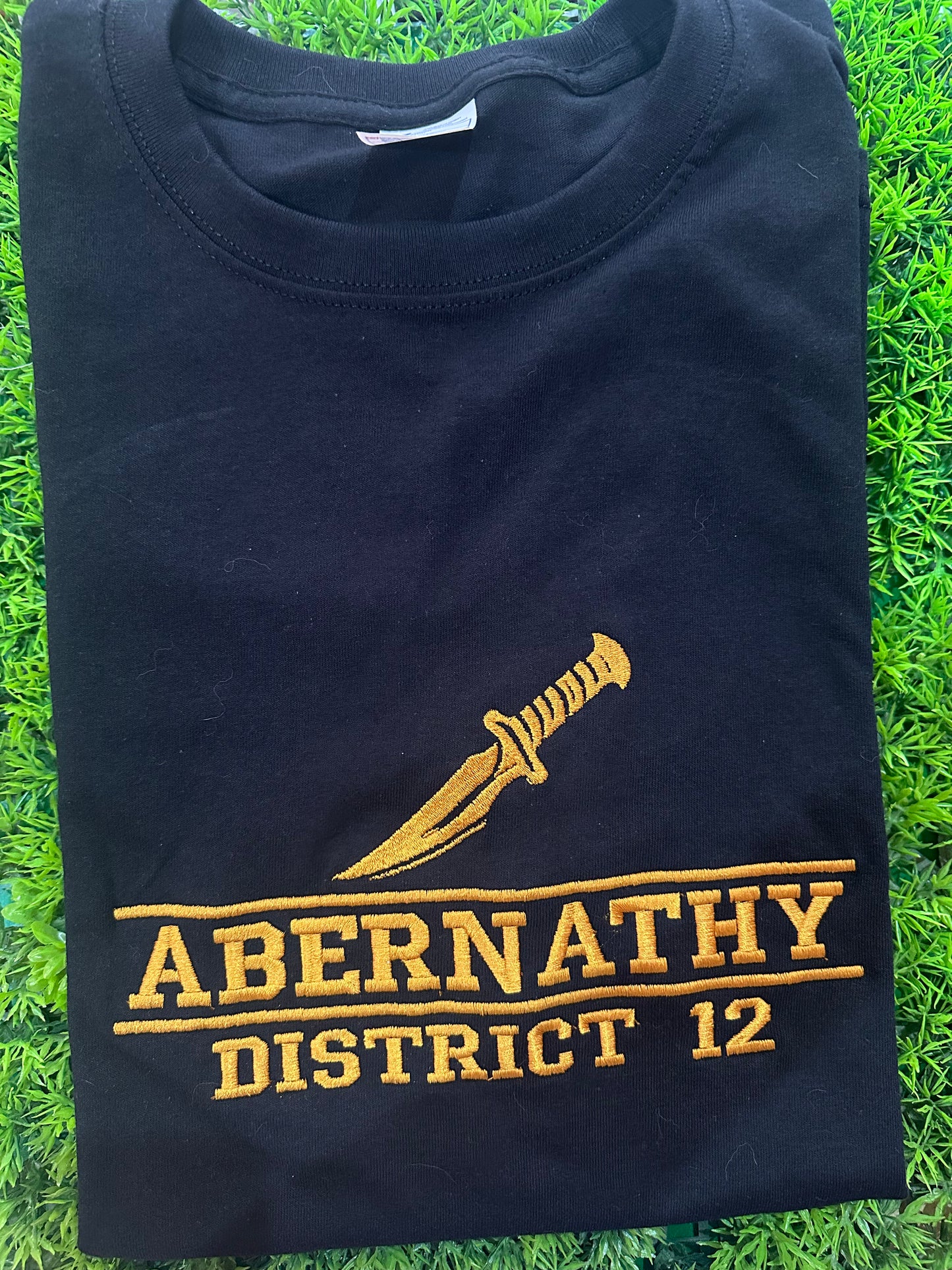 Playera bordada THG